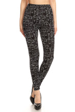 Load image into Gallery viewer, Front view of these delightful black and white leggings.
